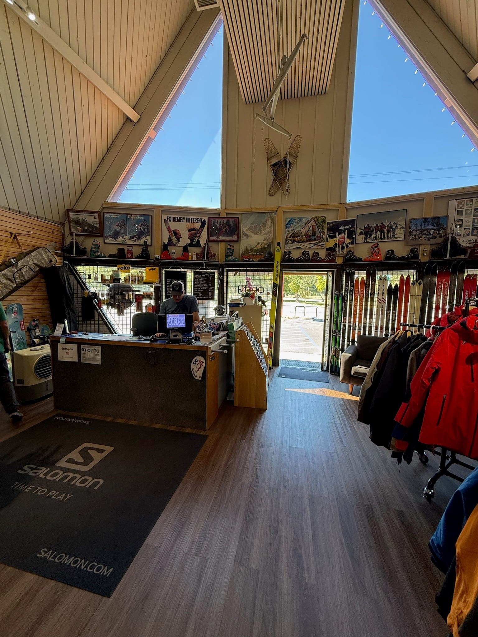 Inside the A-frame, looking out the triangle window over the front counter
